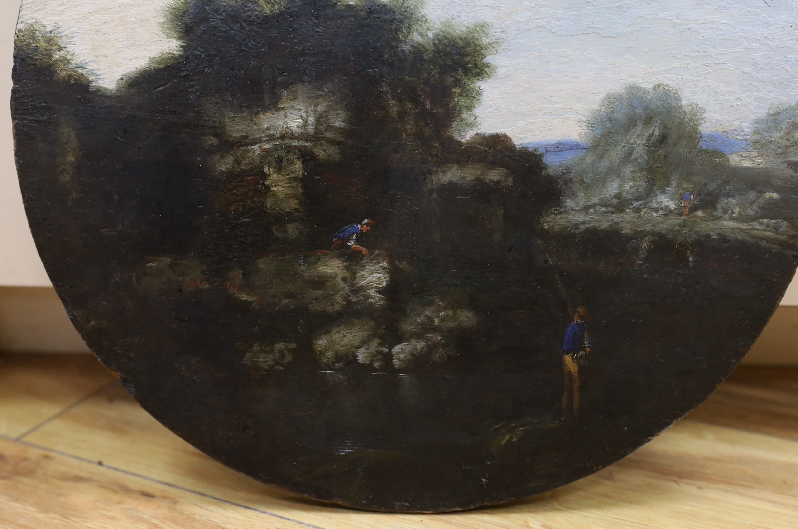 19th century English school, circular oil on wood panel, River landscape with figures fishing, unframed, 32cm in diameter